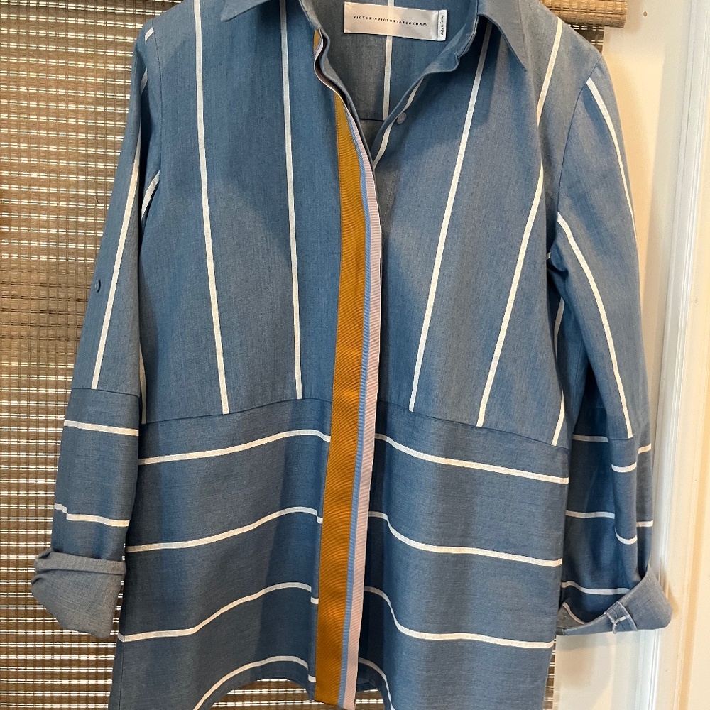 Victoria Beckham blue cotton blouse with white pin stripes.